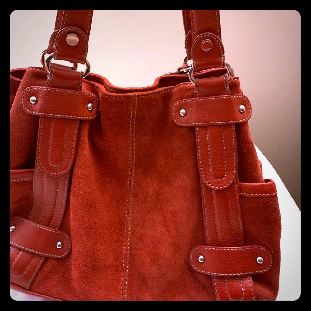 Red suede handbag